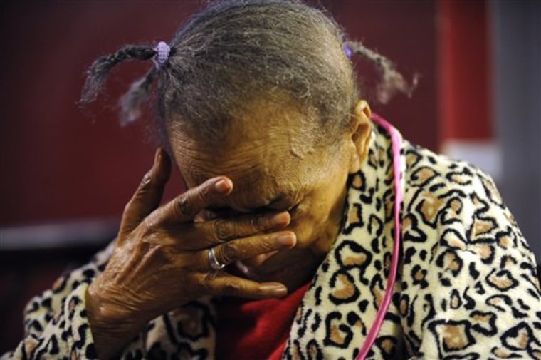 Texana Hollis, 101, reacts on Oct. 3 after discussing her eviction in Detroit.